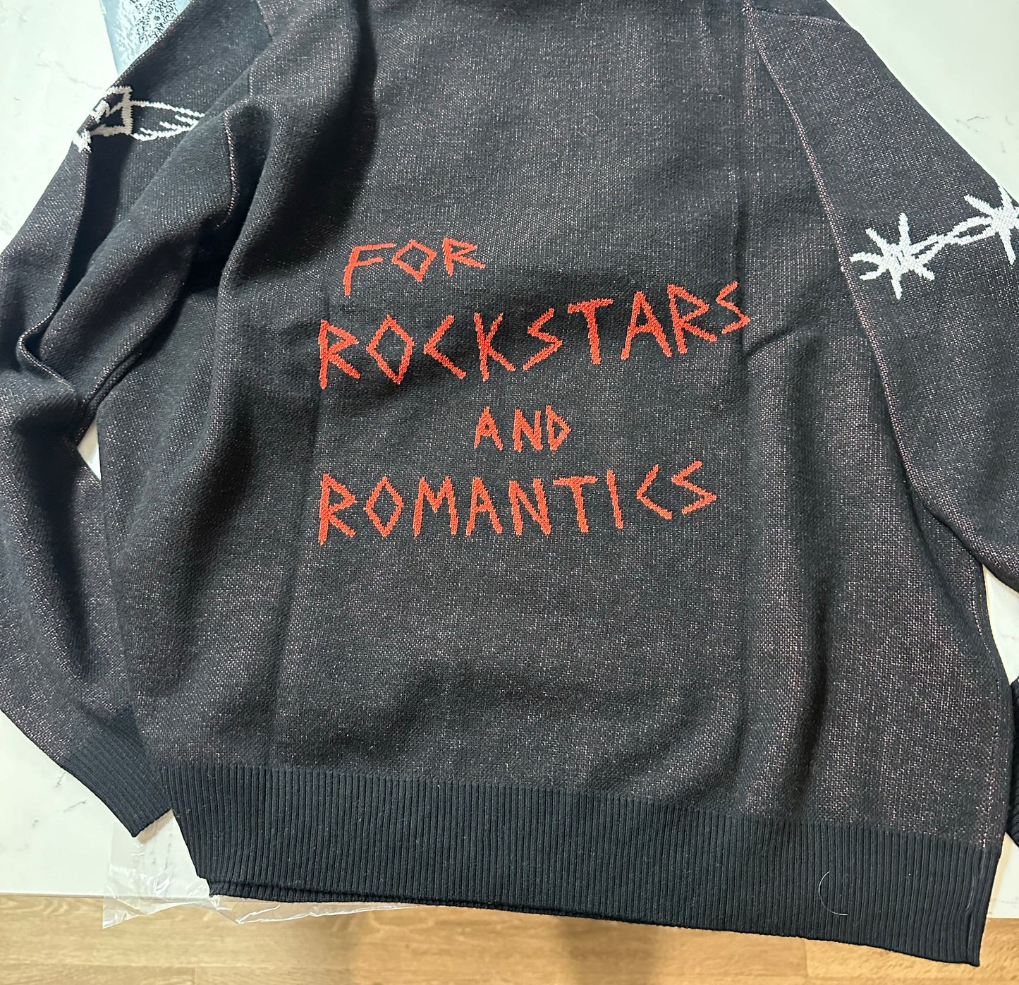 "For Rockstars and Romantics" Knitted Sweater